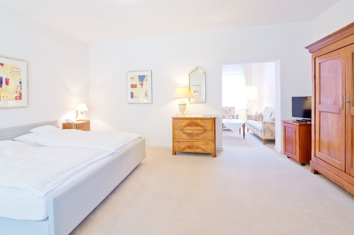 Imagen de la habitación del Hotel Romantik Waldhotel Mangold. Foto 13