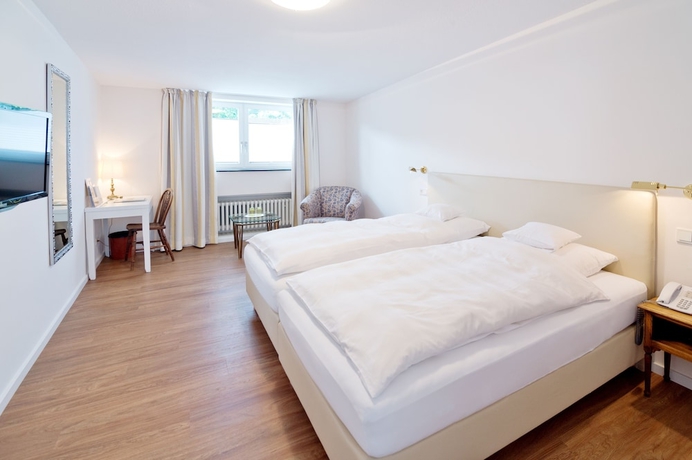 Imagen de la habitación del Hotel Romantik Waldhotel Mangold. Foto 14