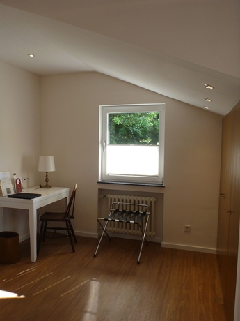 Imagen de la habitación del Hotel Romantik Waldhotel Mangold. Foto 17