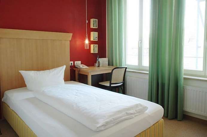 Imagen de la habitación del Hotel Romantikhotel Rebstock Art And Design. Foto 15