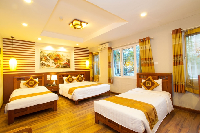 Imagen de la habitación del Hotel Romantique De Hanoi. Foto 3