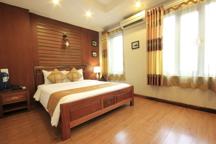 Imagen de la habitación del Hotel Romantique De Hanoi. Foto 10