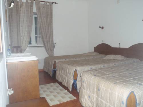 Imagen de la habitación del Hotel Romba. Foto 11