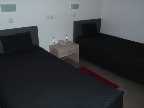 Imagen de la habitación del Hotel Romba. Foto 13