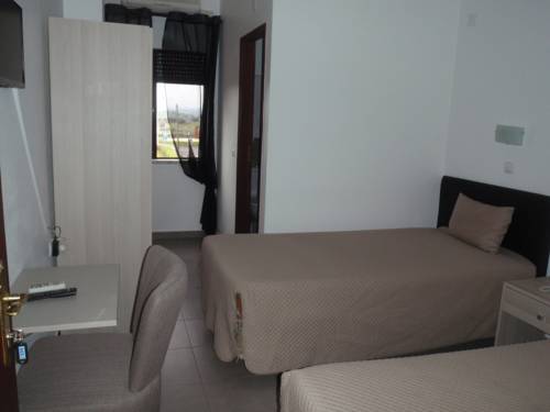 Imagen de la habitación del Hotel Romba. Foto 15