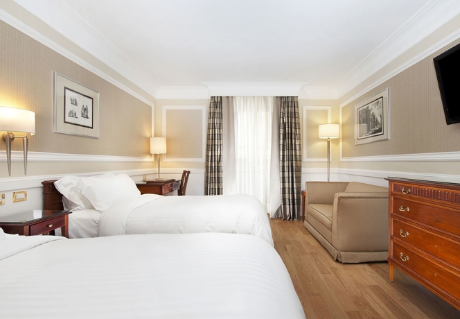 Imagen de la habitación del Hotel Rome Marriott Grand Flora. Foto 2