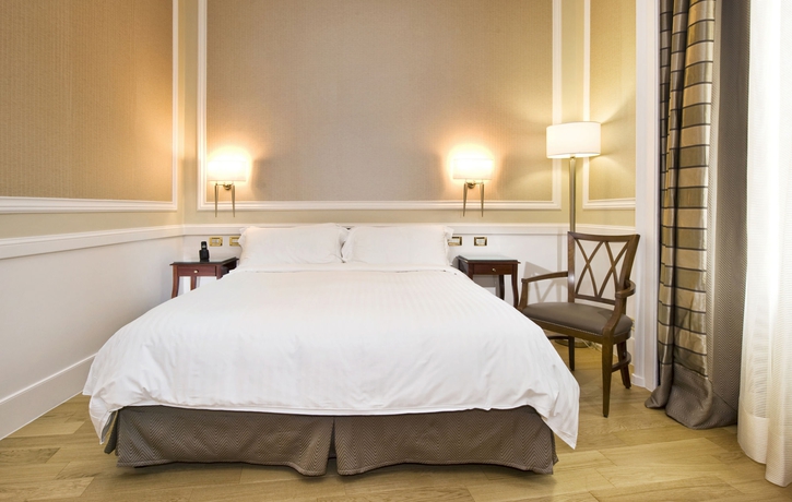 Imagen de la habitación del Hotel Rome Marriott Grand Flora. Foto 4