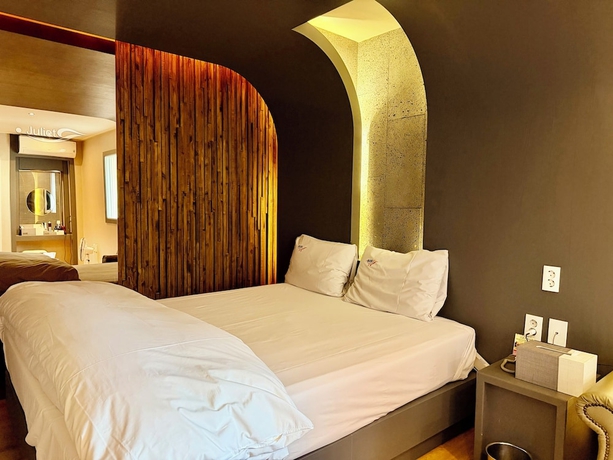Imagen de la habitación del Hotel RomeoandJuliet. Foto 11