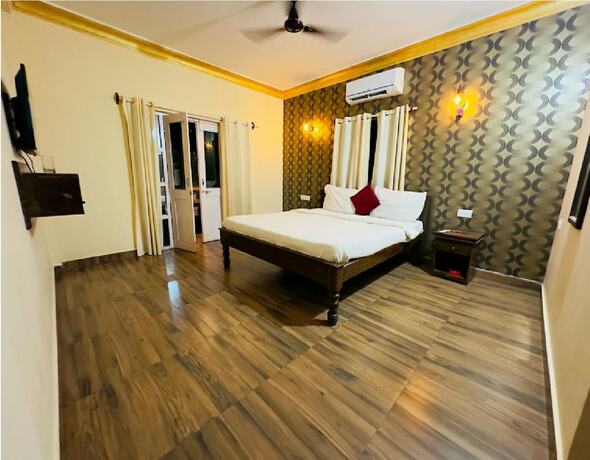 Imagen de la habitación del Hotel Romeo\'s Palace Near Baga Beach. Foto 19