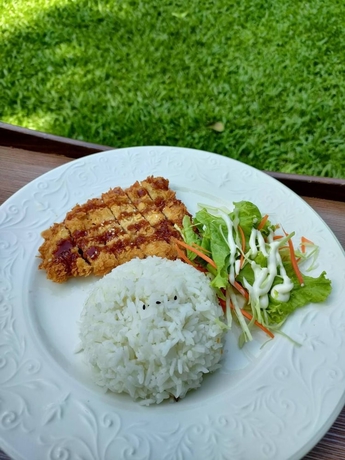 Imagen del bar/restaurante del Hotel Rommai Greenpark Lampang. Foto 2