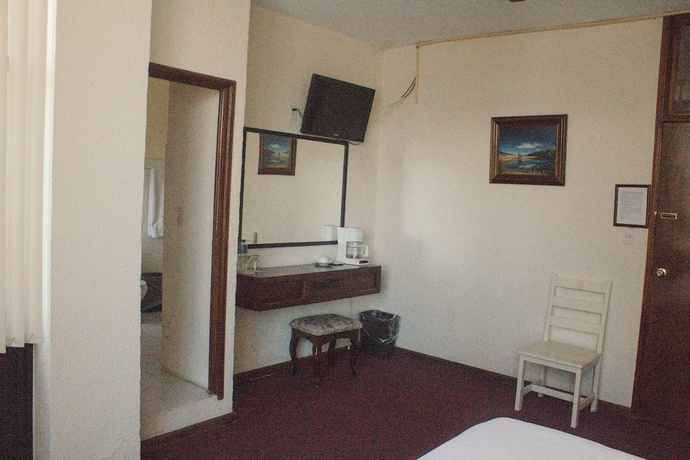 Imagen de la habitación del Hotel Romo. Foto 15