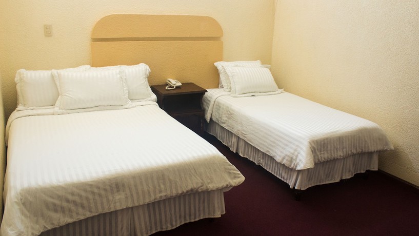 Imagen de la habitación del Hotel Romo. Foto 17
