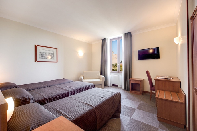 Imagen de la habitación del Hotel Romoli. Foto 12