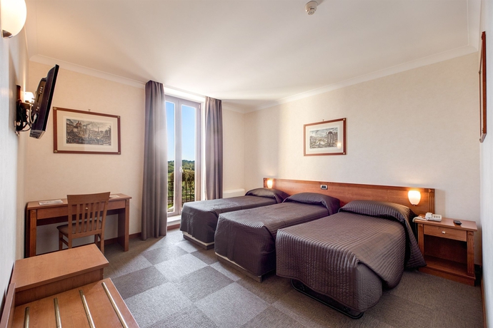 Imagen de la habitación del Hotel Romoli. Foto 13