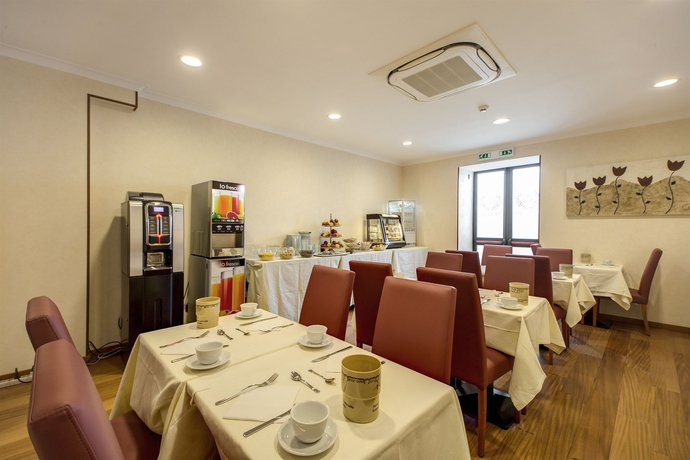 Imagen del bar/restaurante del Hotel Romoli. Foto 8