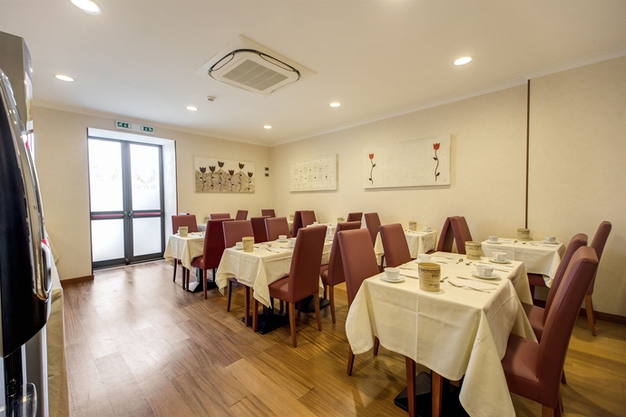 Imagen del bar/restaurante del Hotel Romoli. Foto 10