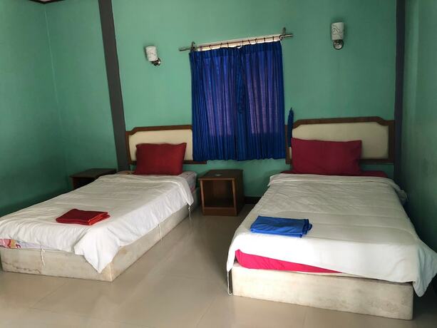 Imagen de la habitación del Hotel Romsai Resort. Foto 17