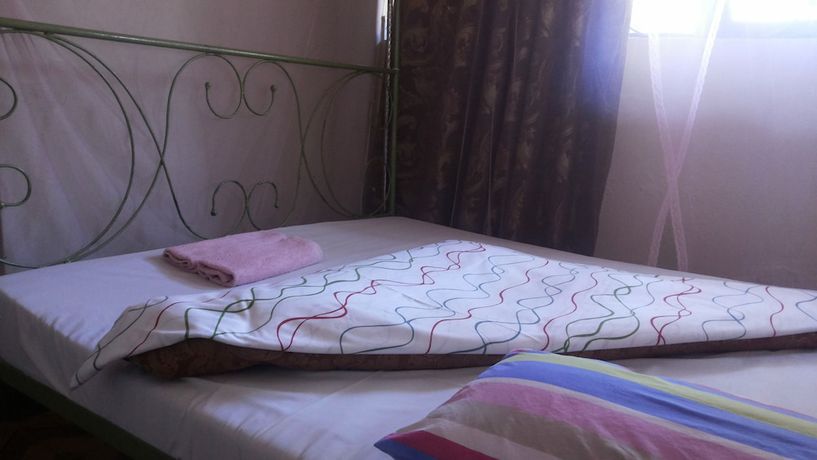 Imagen de la habitación del Hotel Romu Garden. Foto 8