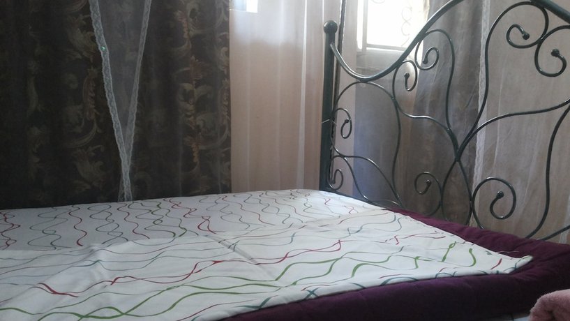 Imagen de la habitación del Hotel Romu Garden. Foto 12