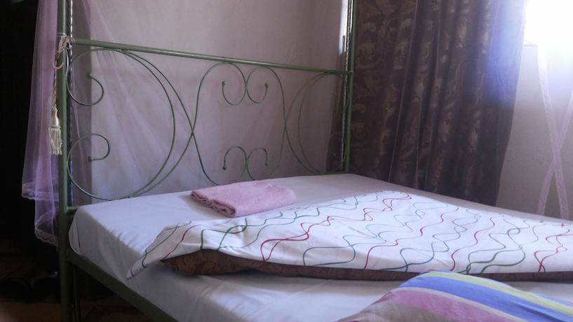 Imagen de la habitación del Hotel Romu Garden. Foto 18