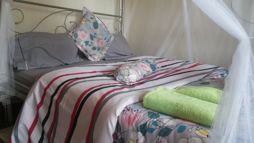 Imagen de la habitación del Hotel Romu Garden. Foto 19