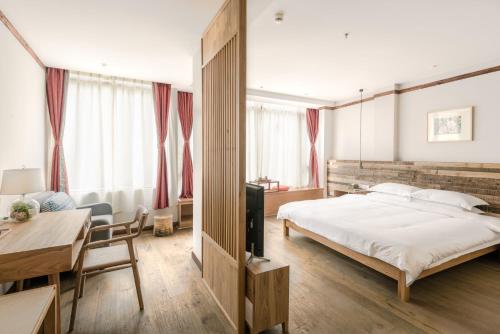 Imagen general del Hotel Ron Inn Xingping Hepan Xiaozhu. Foto 1