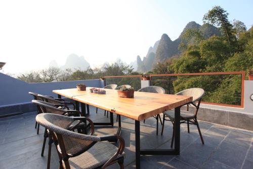 Imagen general del Hotel Ron Inn Xingping Hepan Xiaozhu. Foto 5