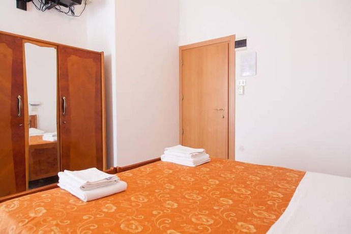 Imagen de la habitación del Hotel Ronconi. Foto 17