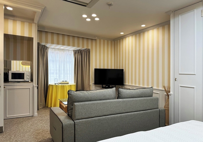 Imagen de la habitación del Hotel Rong Hua Grand Hotel. Foto 15