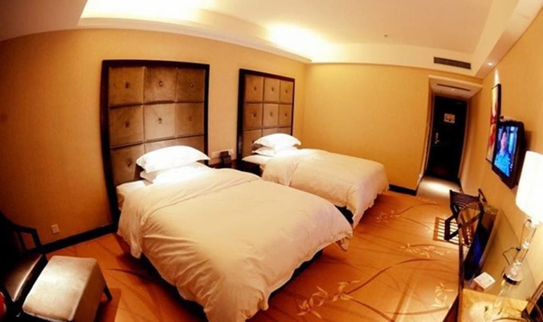 Imagen de la habitación del Hotel Ronghe Holiday Hotel. Foto 5
