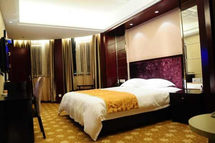 Imagen de la habitación del Hotel Ronghe Holiday Hotel. Foto 8