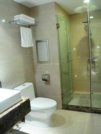 Imagen de la habitación del Hotel Ronghe Holiday Hotel. Foto 9