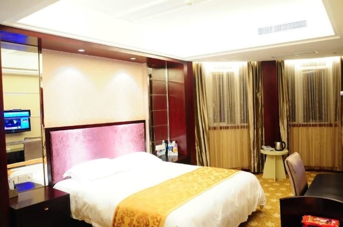 Imagen de la habitación del Hotel Ronghe Holiday Hotel. Foto 10