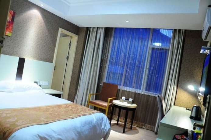 Imagen de la habitación del Hotel Ronghe Holiday Hotel. Foto 18