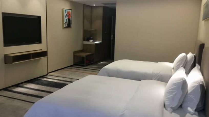 Imagen de la habitación del Hotel Rongjin Shenzhen. Foto 14