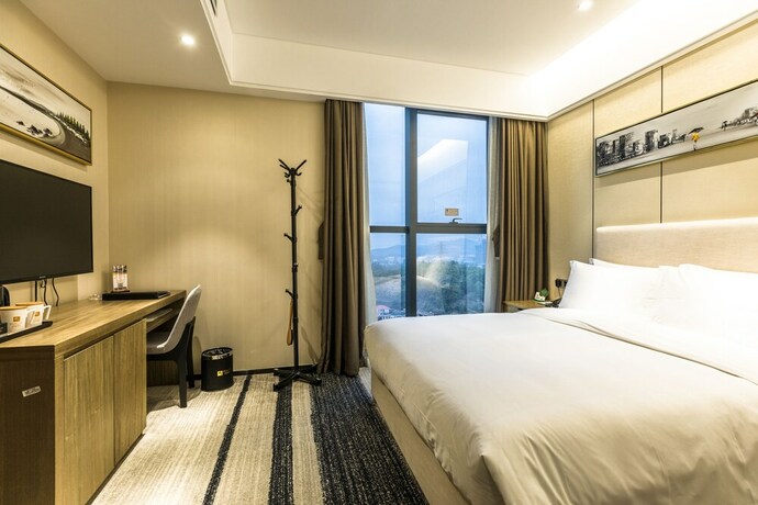Imagen de la habitación del Hotel Rongjin Shenzhen. Foto 15