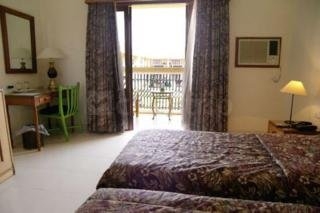 Imagen de la habitación del Hotel Ronil Royale. Foto 5