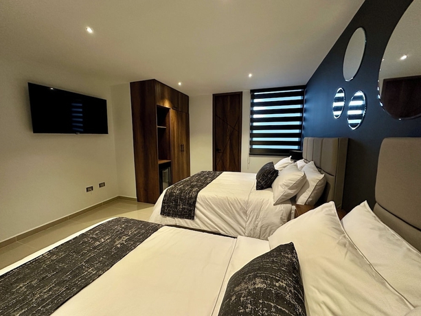 Imagen de la habitación del Hotel Rooca Urban. Foto 13