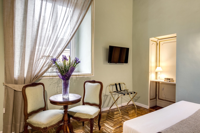 Imagen de la habitación del Hotel Roof Garden Pantheon. Foto 2