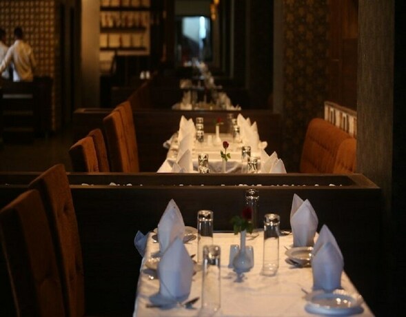 Imagen del bar/restaurante del Hotel Room Maangta 125 - Kalyan East. Foto 15