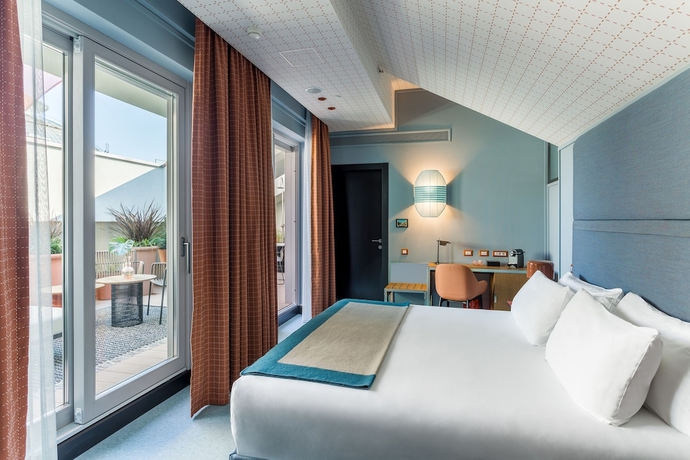 Imagen de la habitación del Hotel Room Mate Giulia. Foto 4