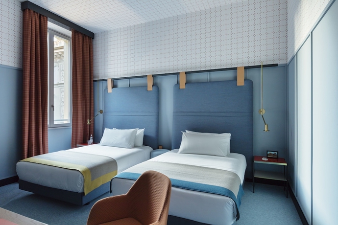 Imagen de la habitación del Hotel Room Mate Giulia. Foto 13