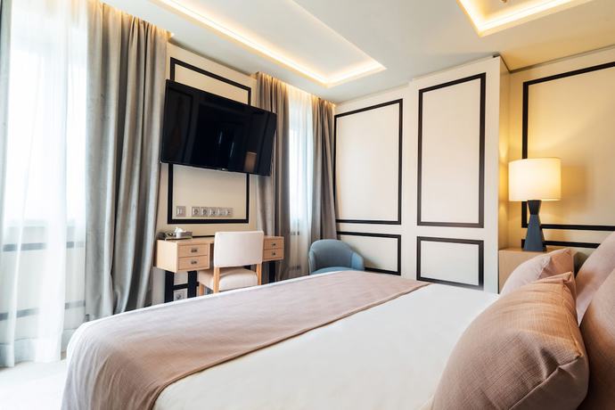 Imagen de la habitación del Hotel Room Mate Gran Filippo. Foto 9