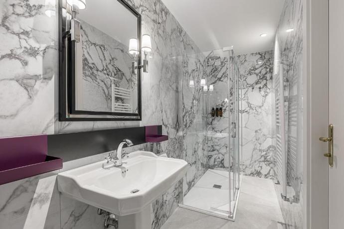 Imagen de la habitación del Hotel Room Mate Luca. Foto 3