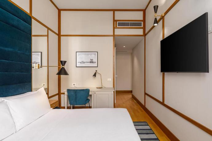 Imagen de la habitación del Hotel Room Mate Luca. Foto 8