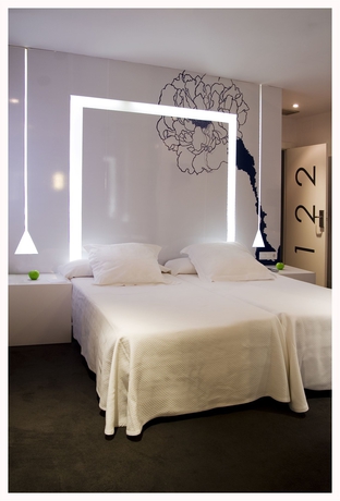 Imagen de la habitación del Hotel Room Mate Mario. Foto 5