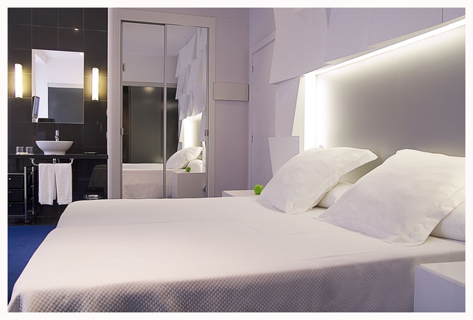 Imagen de la habitación del Hotel Room Mate Mario. Foto 6