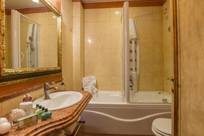 Imagen de la habitación del Hotel Room007 Select Via Veneto. Foto 8