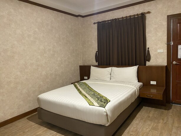 Imagen de la habitación del Hotel RoomQuest Chonburi Laem Chabang. Foto 17