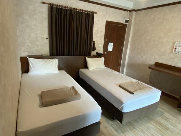 Imagen de la habitación del Hotel RoomQuest Chonburi Laem Chabang. Foto 18